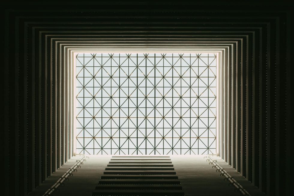 a dark room with a window