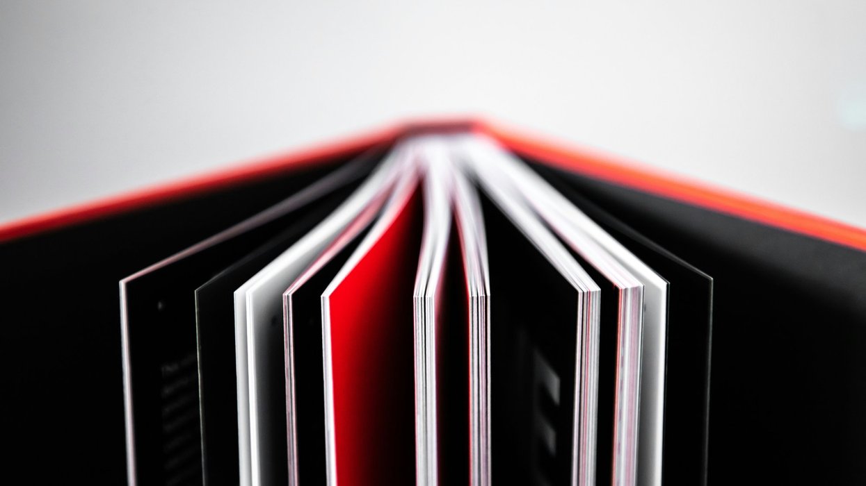 black red and white striped textile