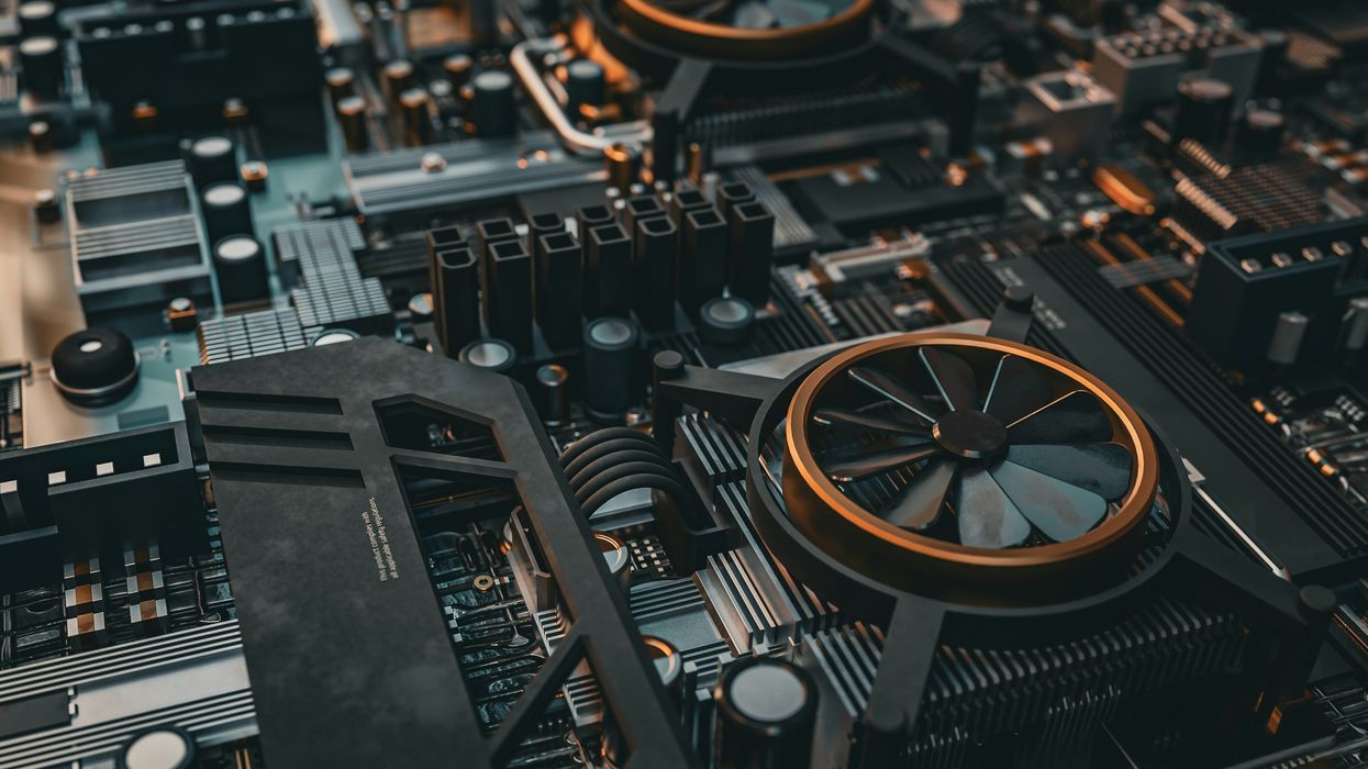 close-up of a detailed circuit board with cooling fans and other components