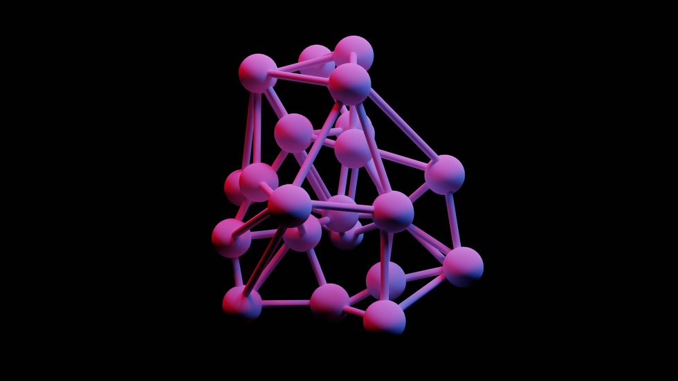geometric 3D structure with pink and purple spheres connected by rods on a black background