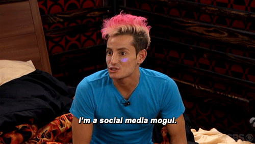 gif of a guy with pink hair and blue shirt saying "I am a social media mogul"