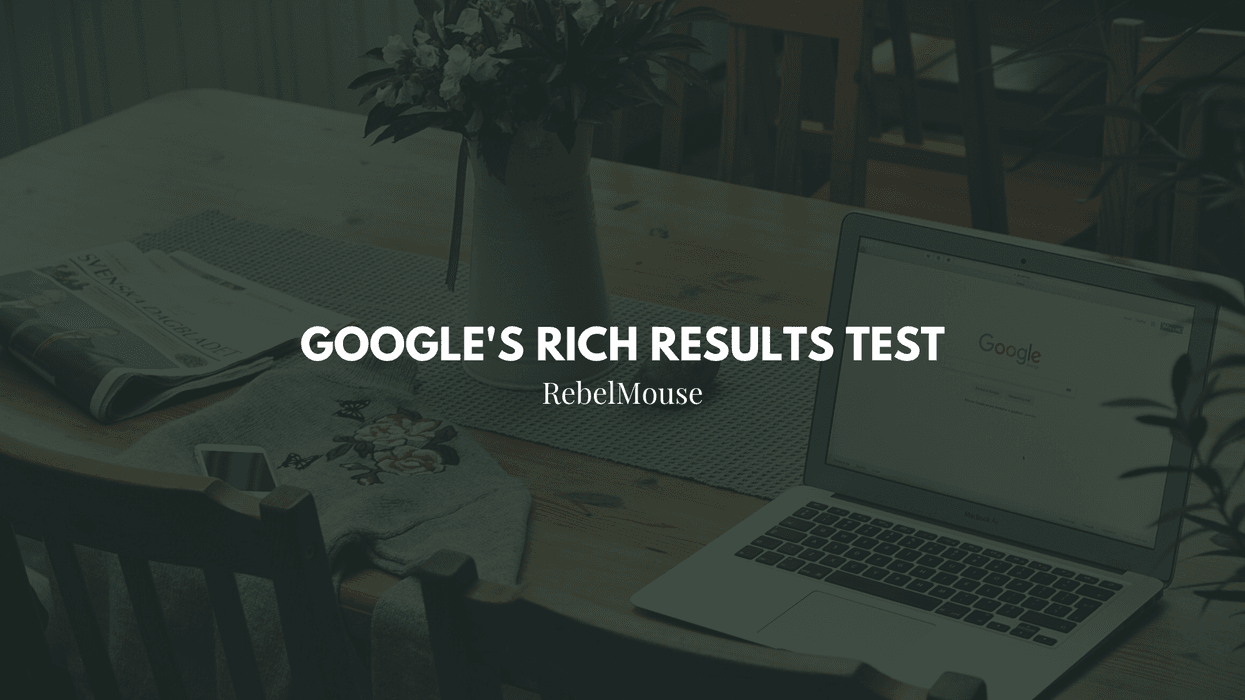 Google's Rich Results Test overlaid on top of a laptop computer visiting Google