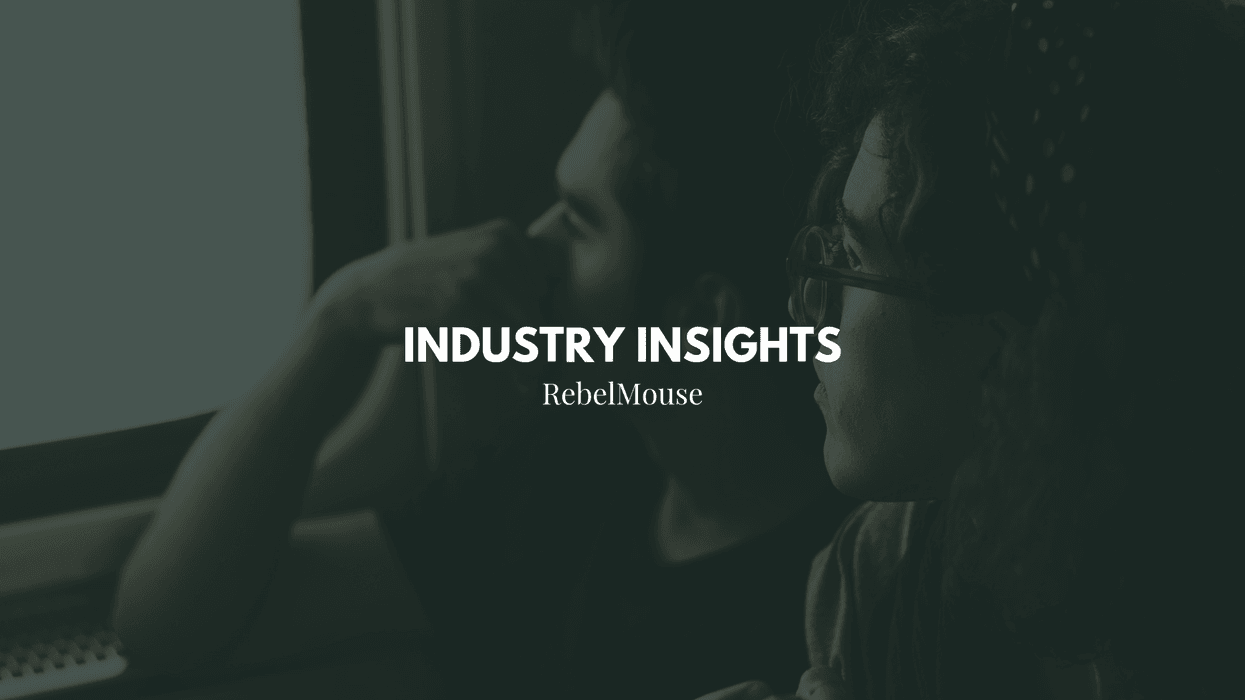Industry Insights text over a dark image of two people looking out a window.
