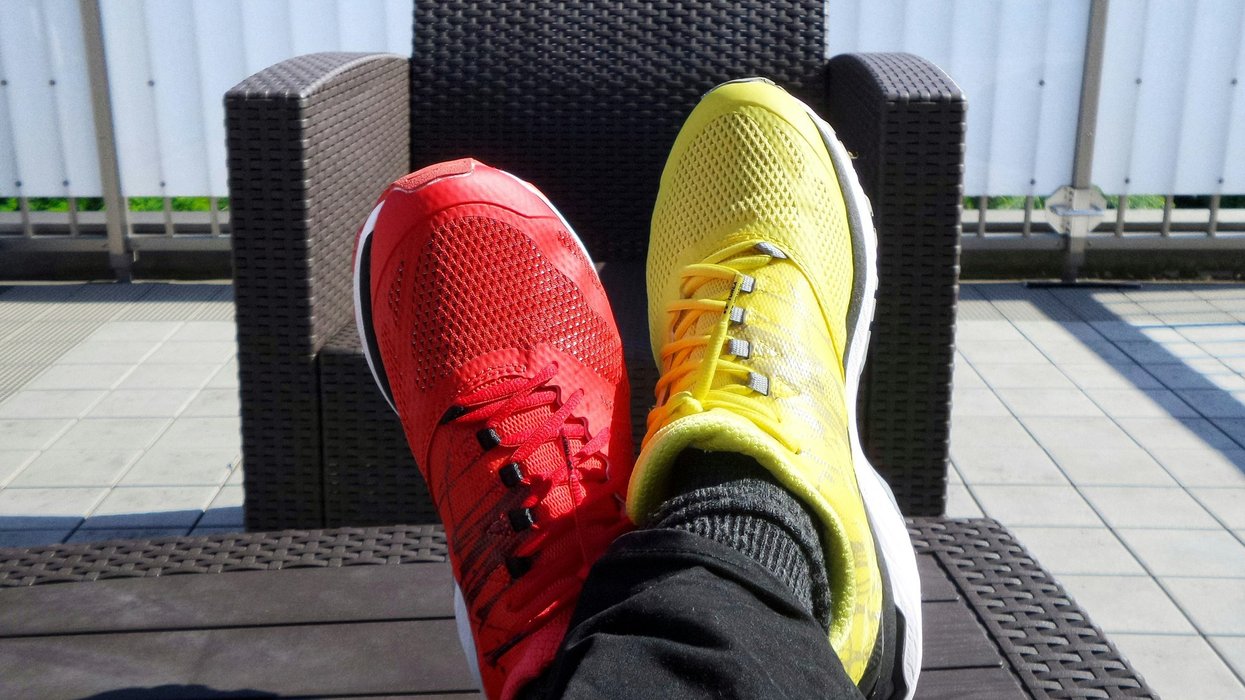 pair of red-and-yellow sneakers