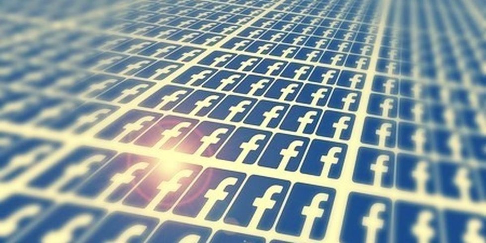 Repeating pattern of Facebook logos on blue squares with a vintage filter.