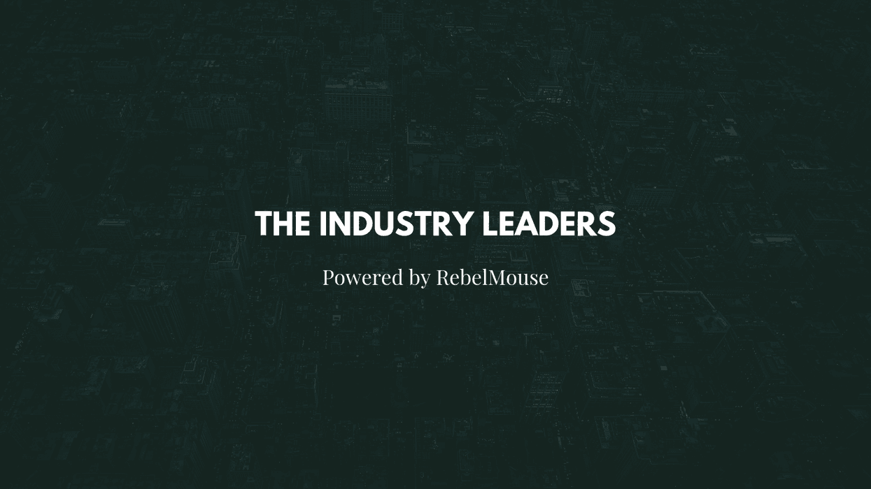"The Industry Leaders" text on a dark, aerial city background.